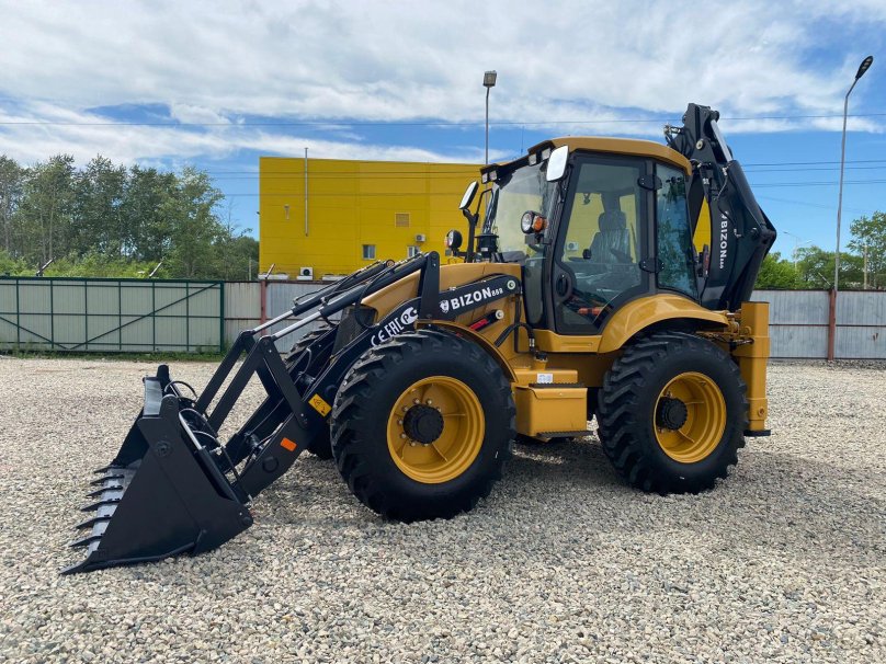 Bizon 888 экскаватор-погрузчик
