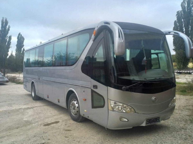 Серый автобус