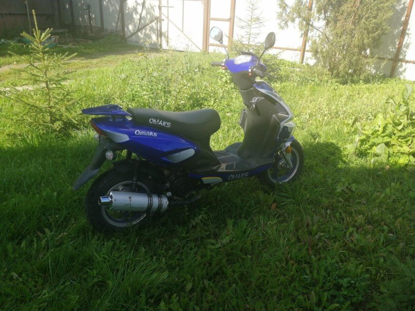 Скутер омакс 50