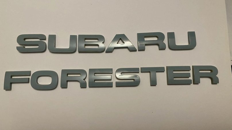 Субару Форестер надпись