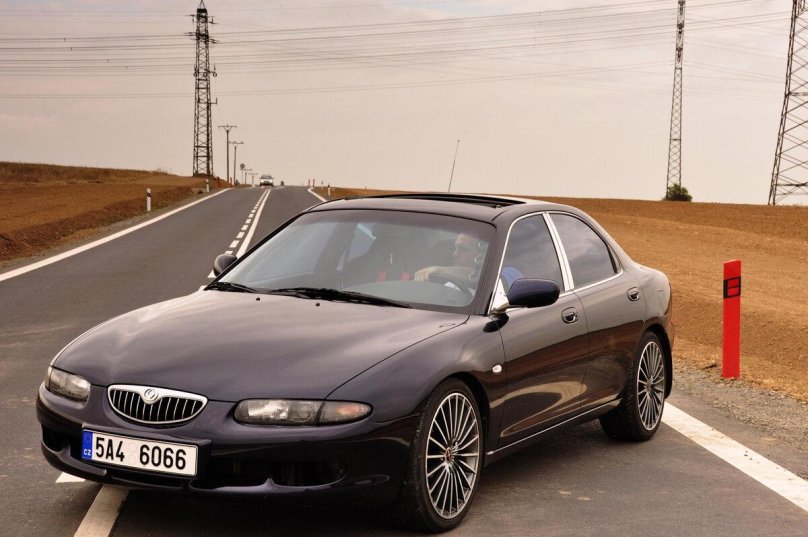 Mazda Кседос 6