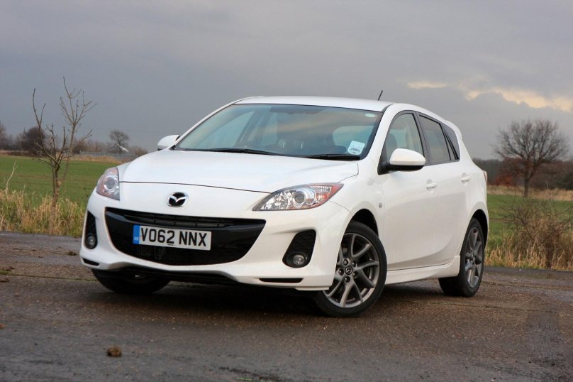 Мазда тройка хэтчбек 2009