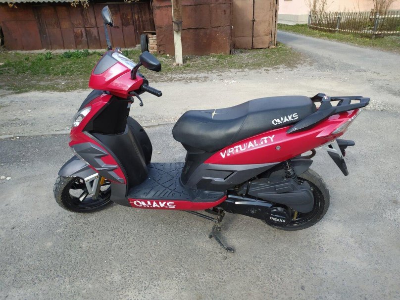Скутер омакс 50