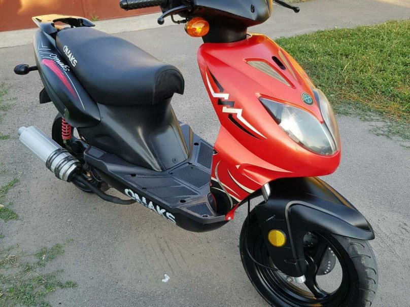 Скутер омакс 50