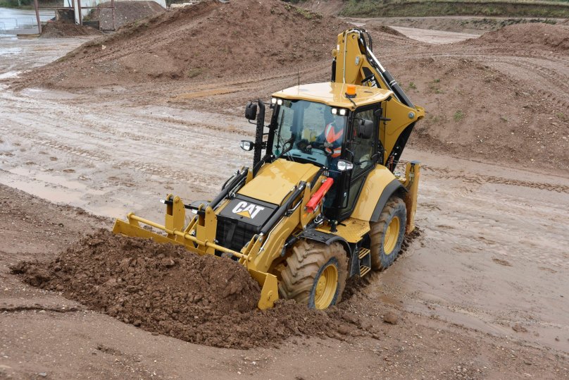 Экскаватор-погрузчик Caterpillar 444