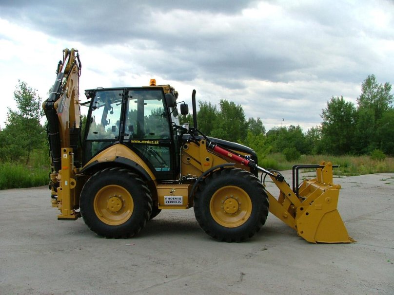Колесный экскаватор Caterpillar 444