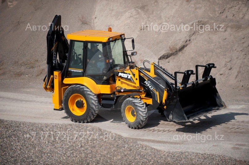 MST 542 экскаватор погрузчик