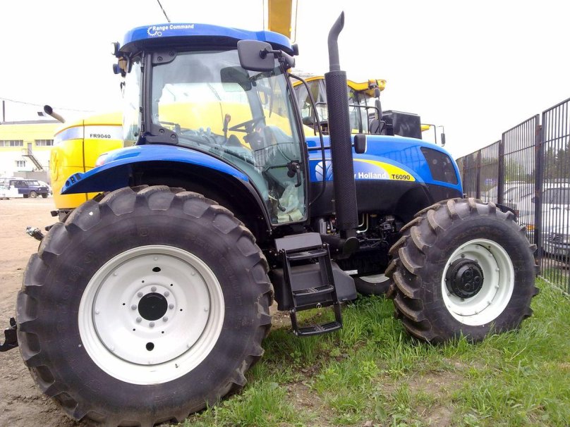 Нью Холланд 9040
