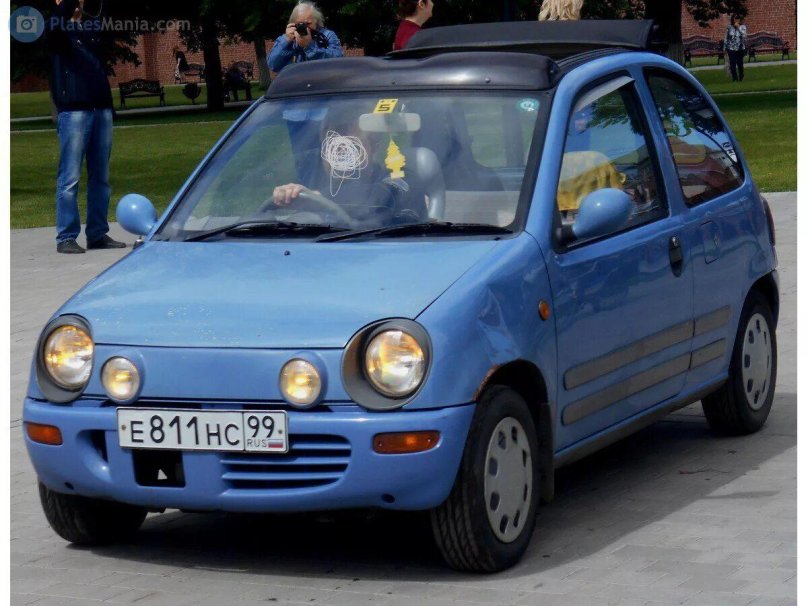 Мазда Autozam Carol