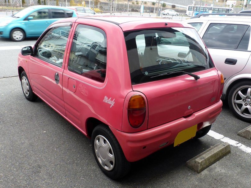 Мазда Autozam Carol