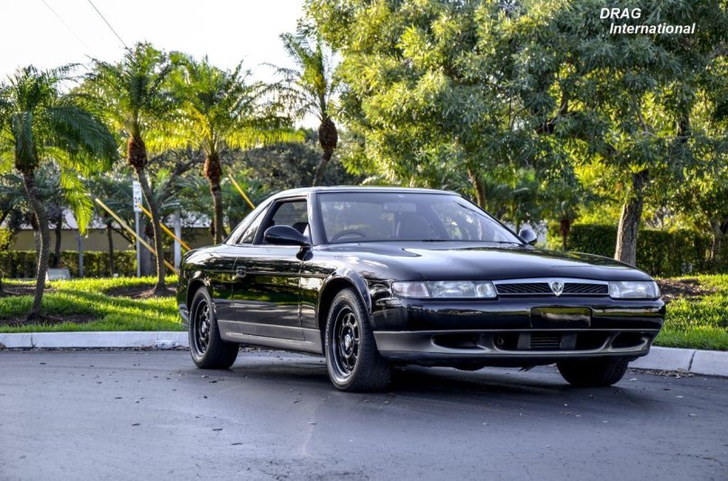 Мазда Еунос Космо