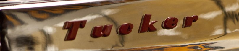 Tucker логотип