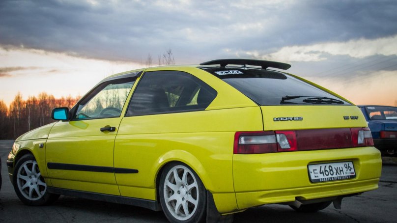 ВАЗ 2112 купе желтая