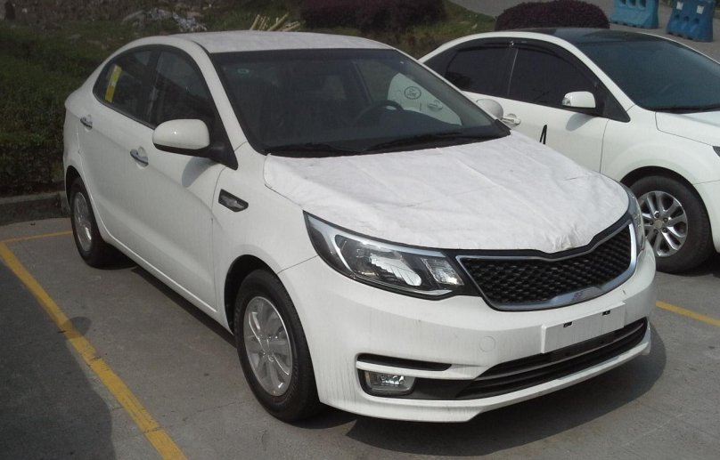 Киа Рио белая