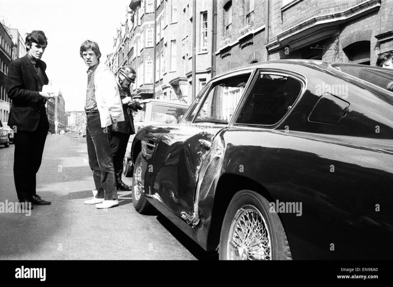 Mick Jagger with his Aston Martin db6 1966
