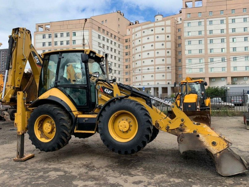 Экскаватор-погрузчик Катерпиллер 434f