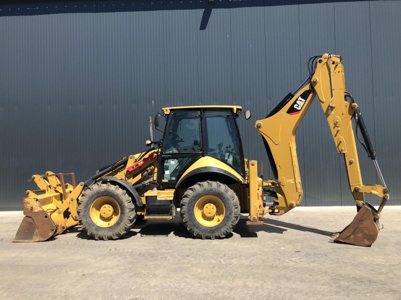 Экскаватор-погрузчик Caterpillar 444