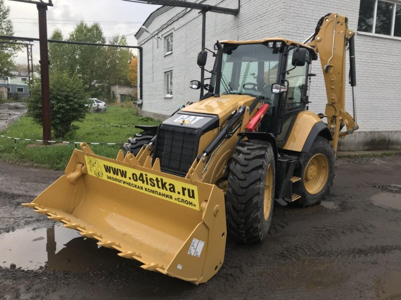Экскаватор-погрузчик Катерпиллер 434f