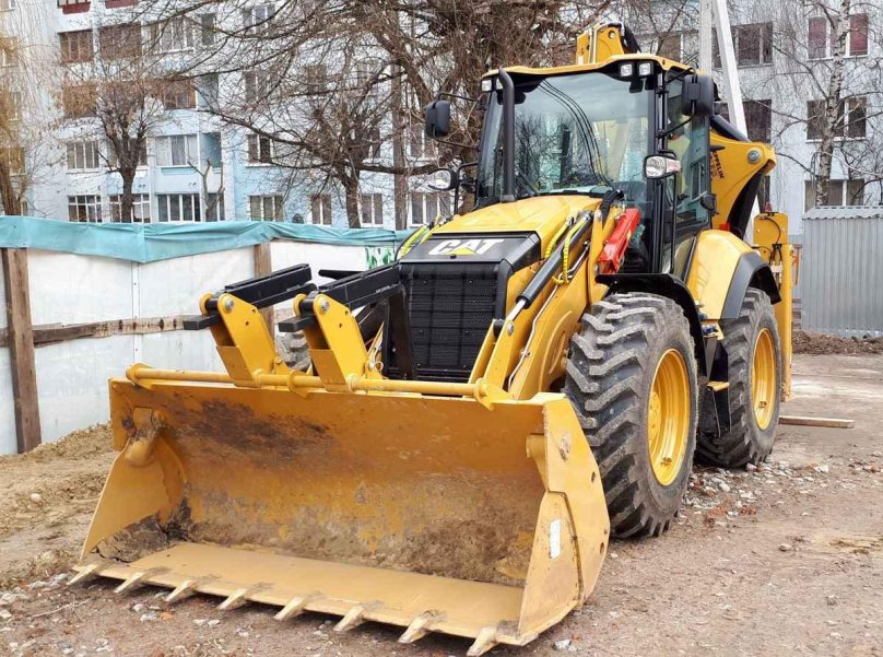 Экскаватор-погрузчик Cat 434