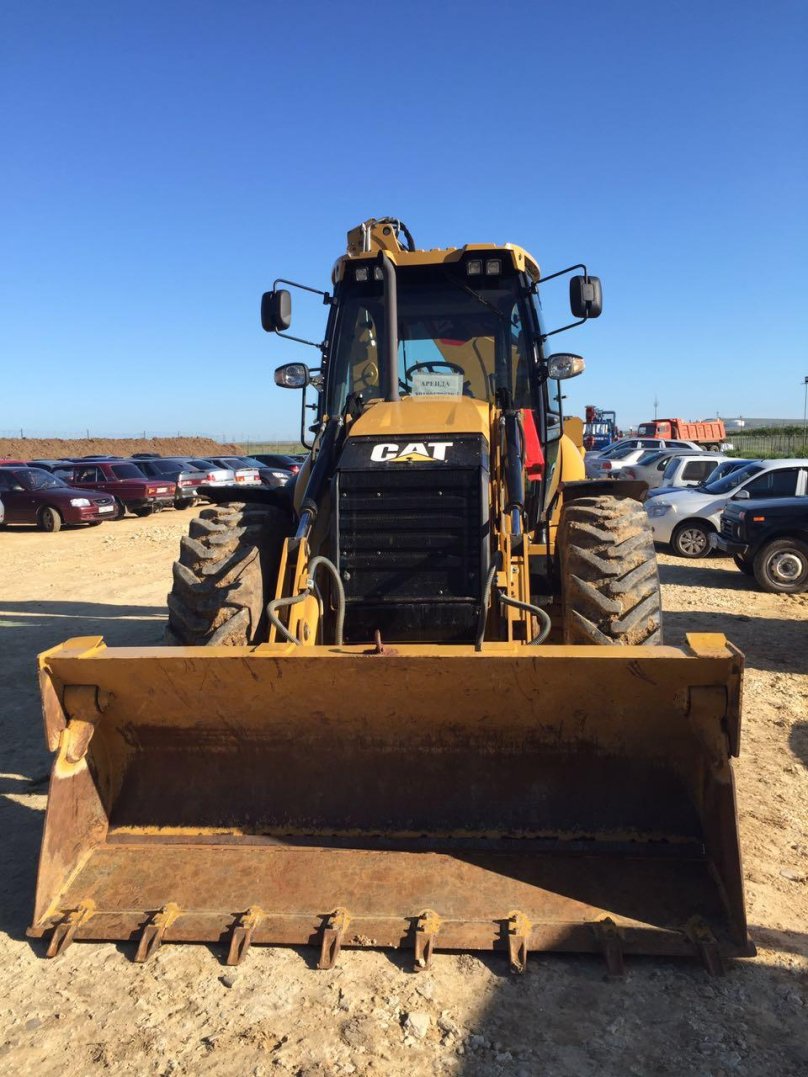 Экскаватор-погрузчик Катерпиллер 434f