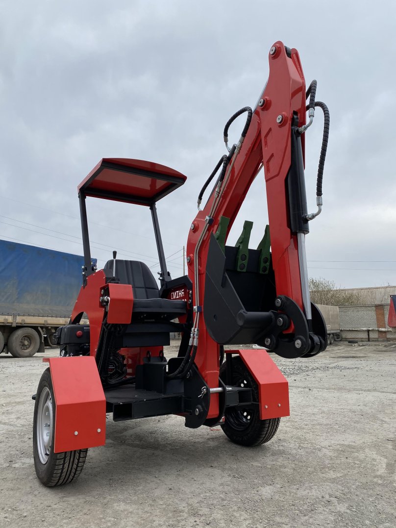 Мини экскаватор ред Рино