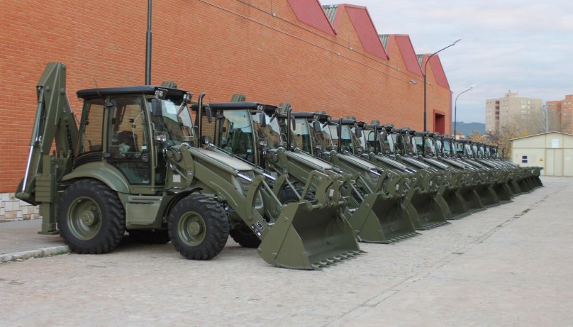 Bizon 777 экскаватор погрузчик