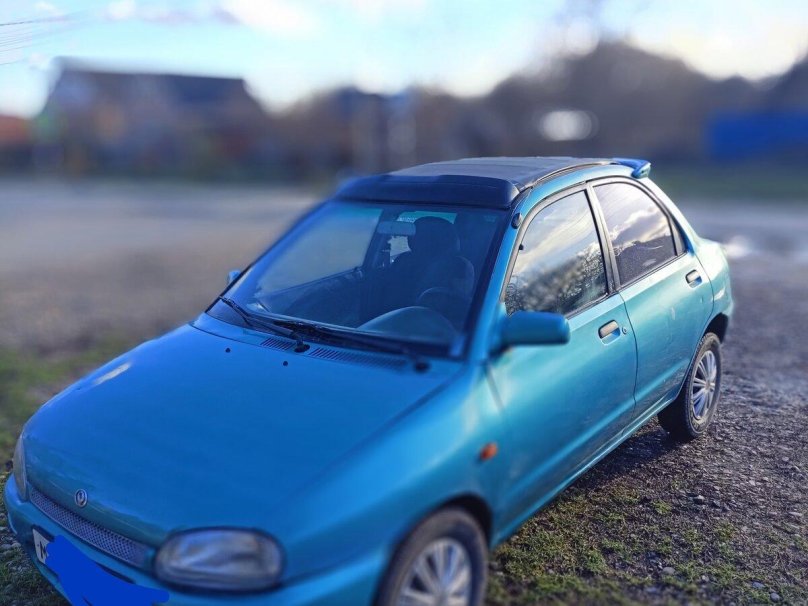 Мазда 121 1996 белая