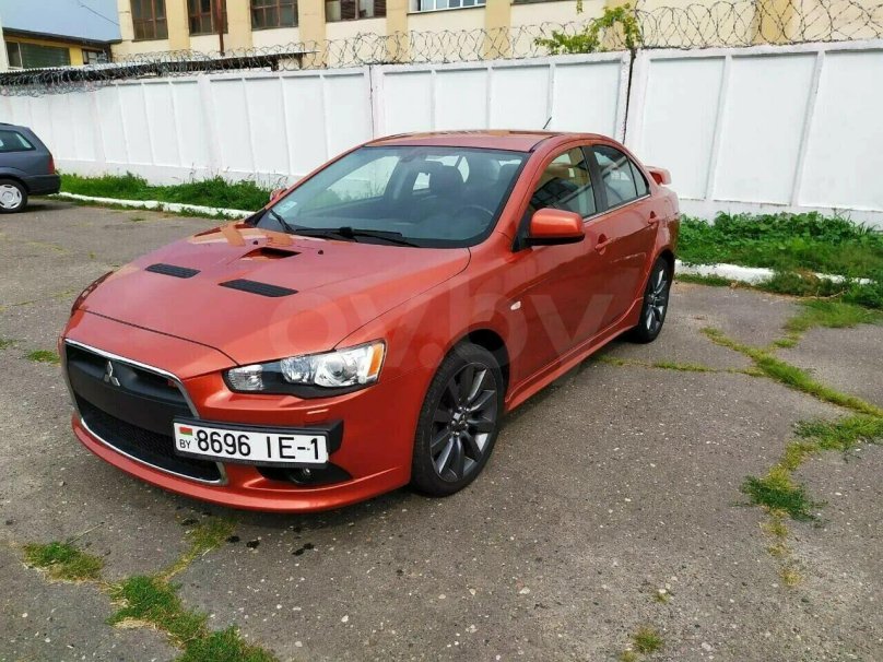 Mitsubishi Lancer 10 красный