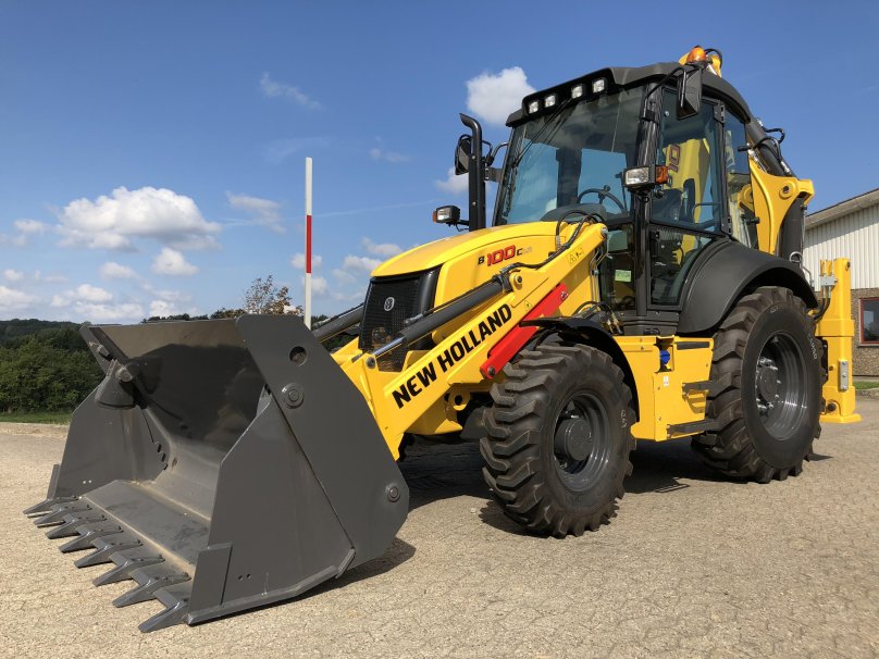 Экскаватор погрузчик Нью Холланд 100