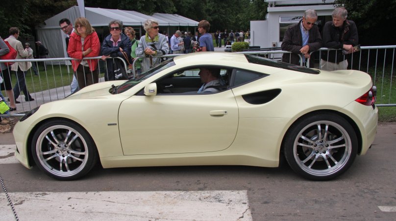 Artega/автомобиль белый