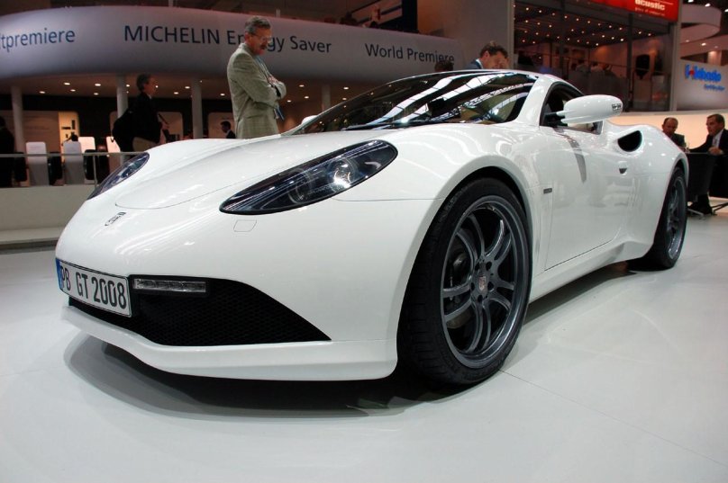 Artega/автомобиль белый