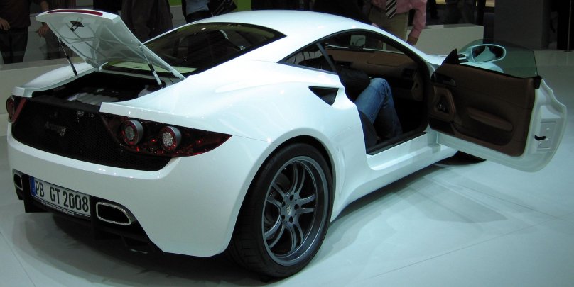 Artega/автомобиль белый