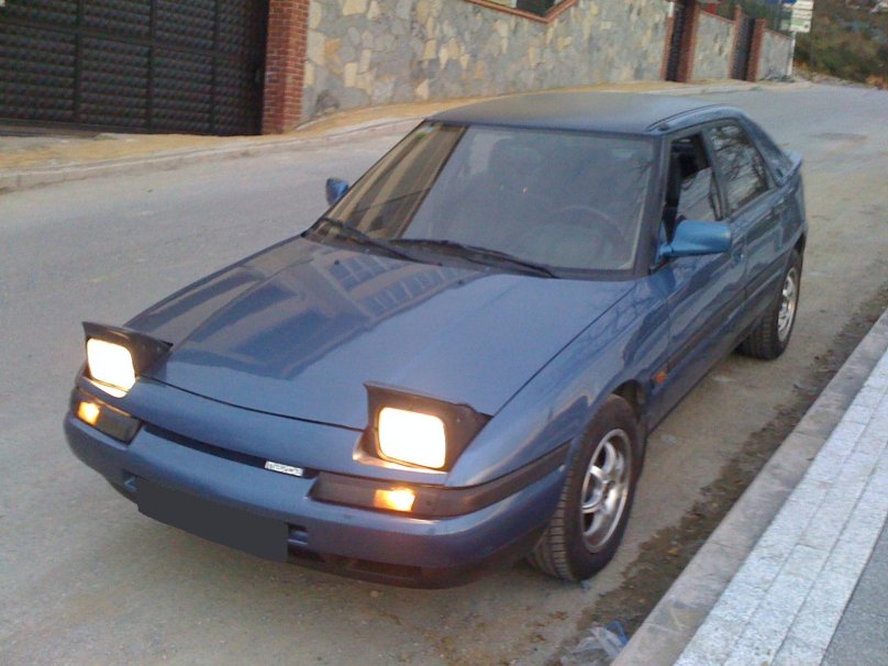 Мазда с открывающимися фарами 323