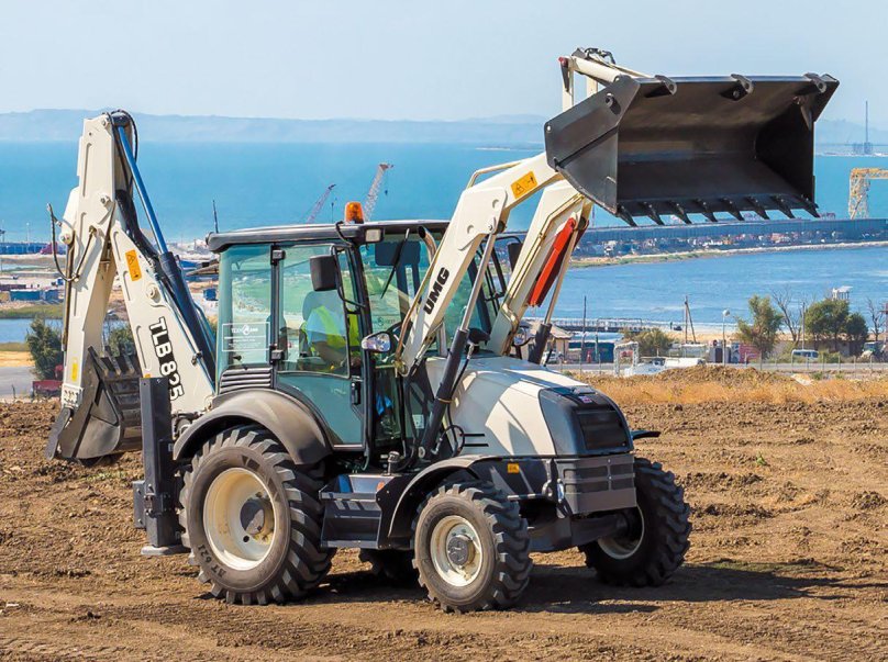 TLB 935 экскаватор погрузчик