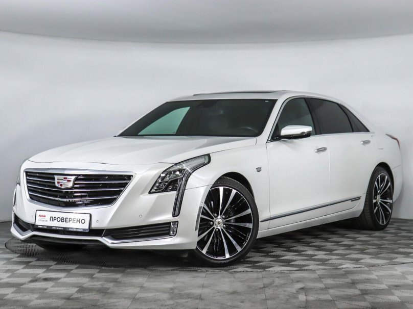 Кадиллак седан белый