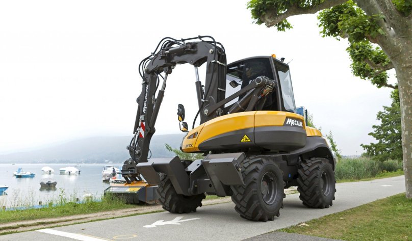 Mecalac 12 MTX экскаватор погрузчик