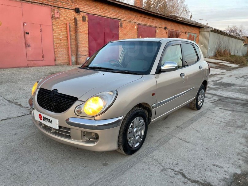 Daihatsu storia 2002 салон