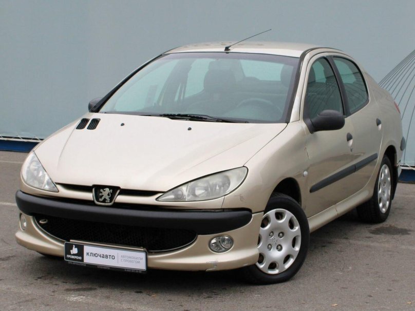 Пежо 206 серебристый