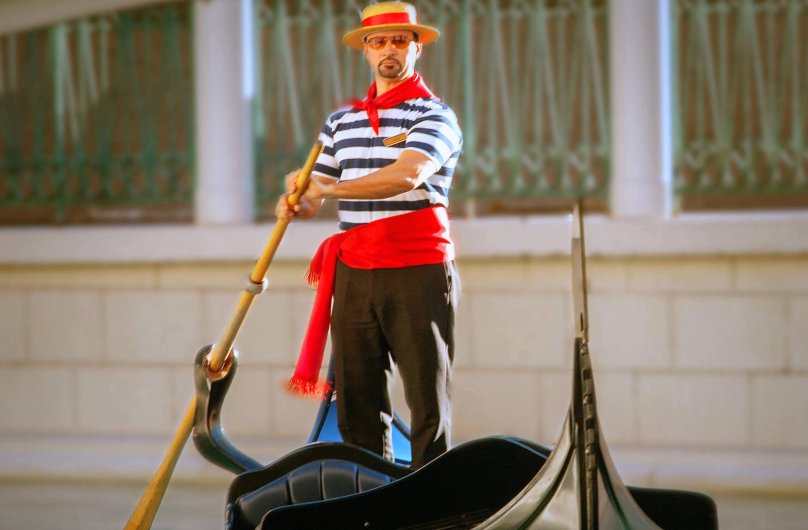 Гондольеры в Венеции