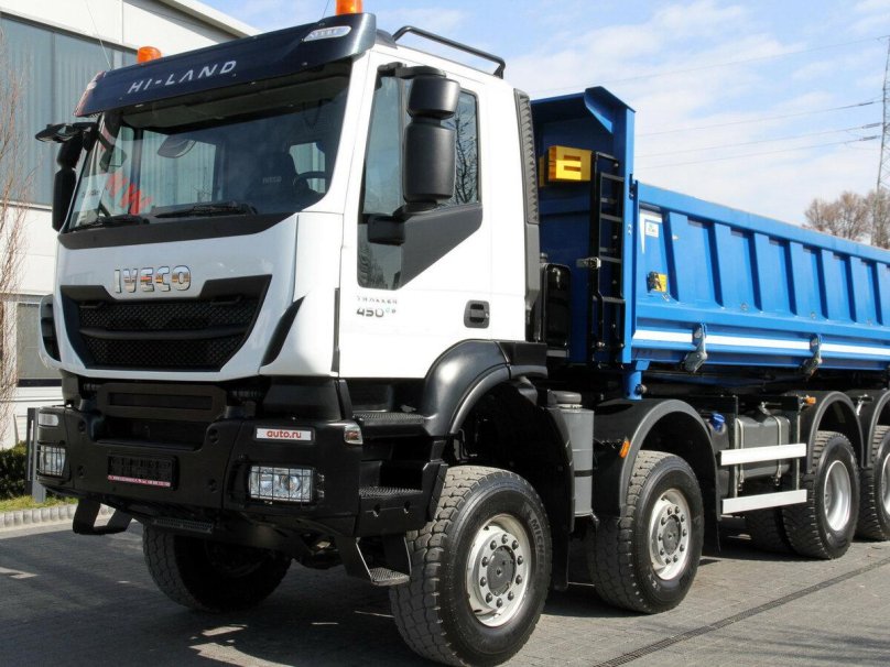 Ивеко тракер 8x4 оранжевый