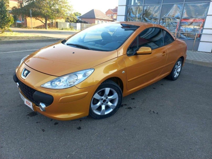 Пежо оранжевый