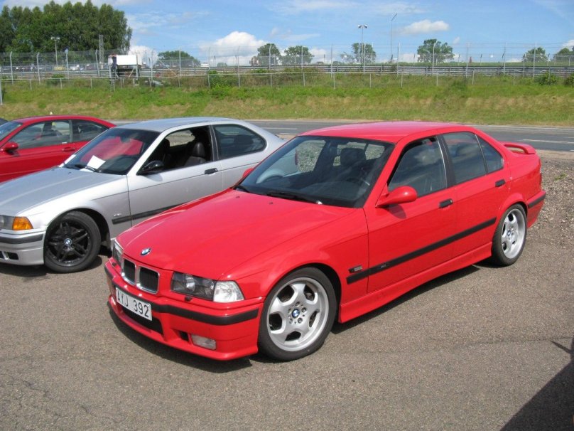 BMW e36 Red sedan