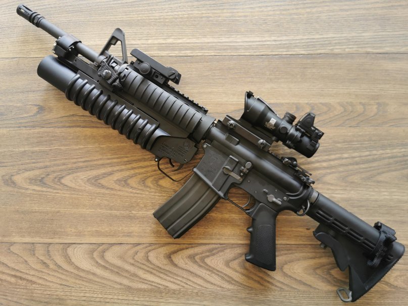 M203
