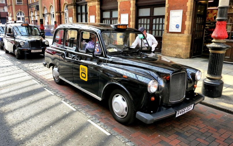 Английское такси КЭБ