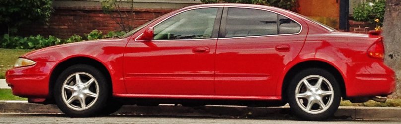 Задний фонарь Олдсмобиль Алеро