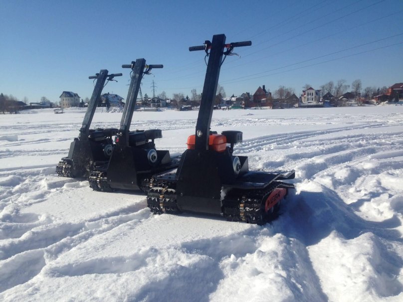 Motor snow scooter standing