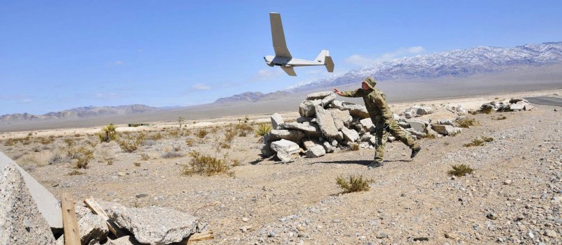 Барражировать