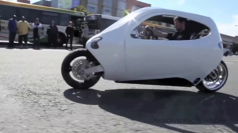 Мотоцикл неваляшка